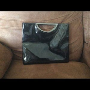 Black glossy vinyl looking large purse clutch